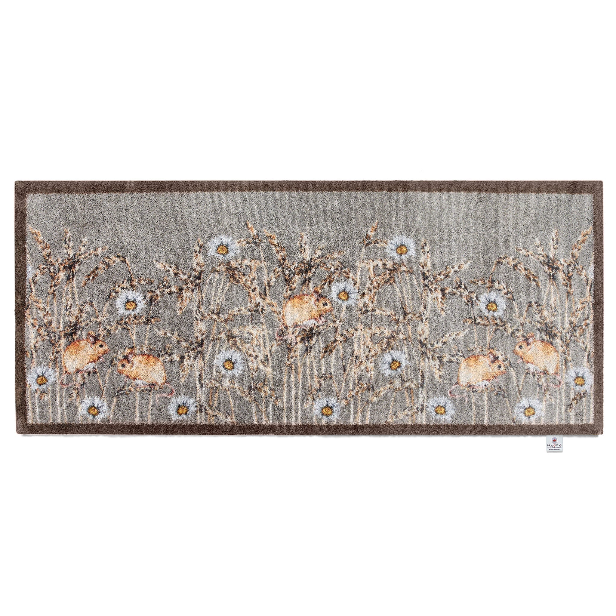 Decorative rug runner with floral and deer design on a gray background