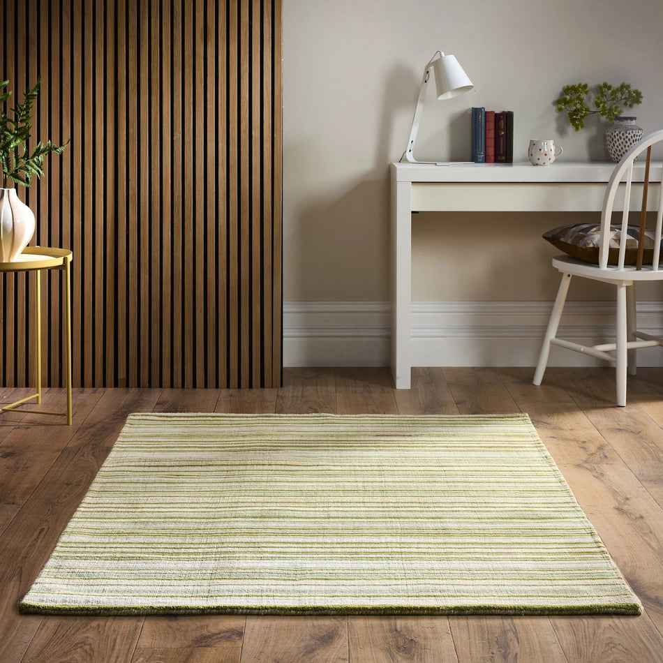 origins Fine Stripes Green wool rug – in living room