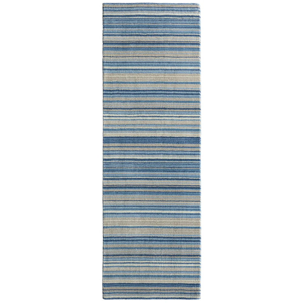Striped blue and beige rug runner on a white background