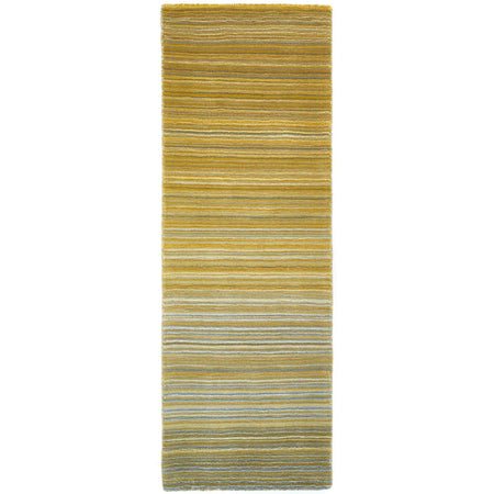 Striped yellow and green rug on a white background