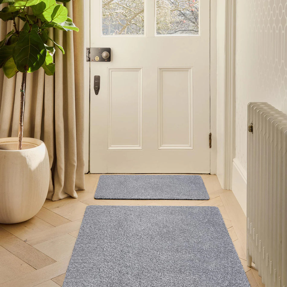 Silver flecked washable Hug Rug mat by the door