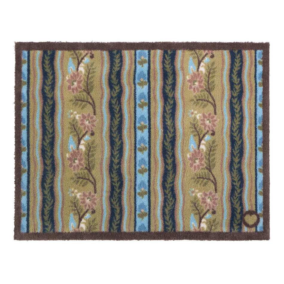 Decorative rug with floral and striped pattern on a white background