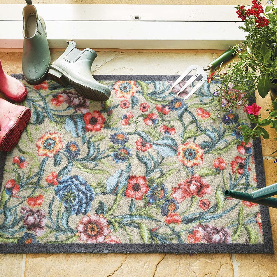 Close-up of Hug Rug bright floral tufting

