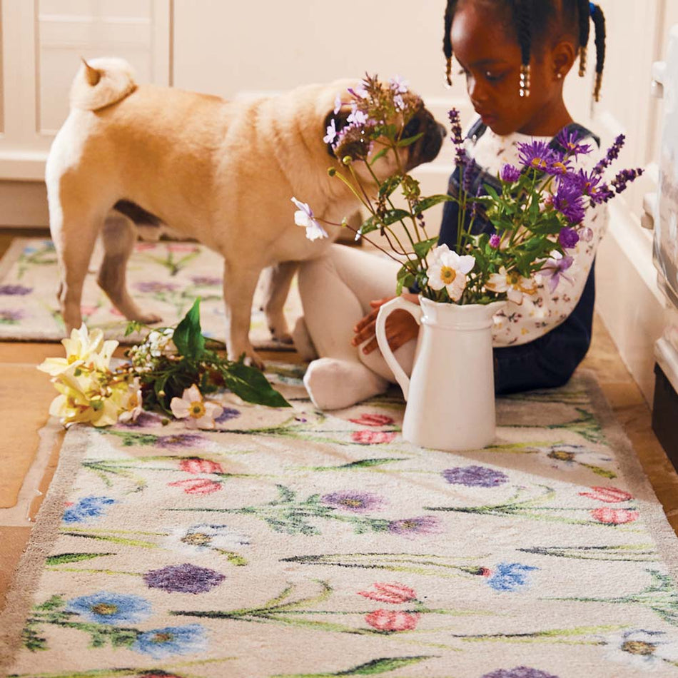 Hug Rug with colourful floral design in hallway