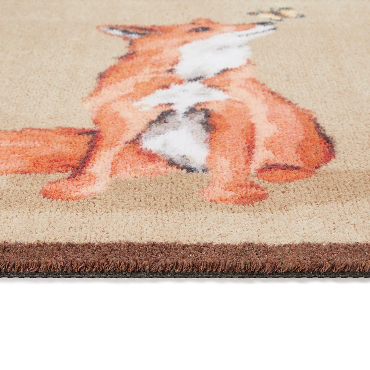 Close-up of Hug Rug Ginger Fox's non-slip backing


