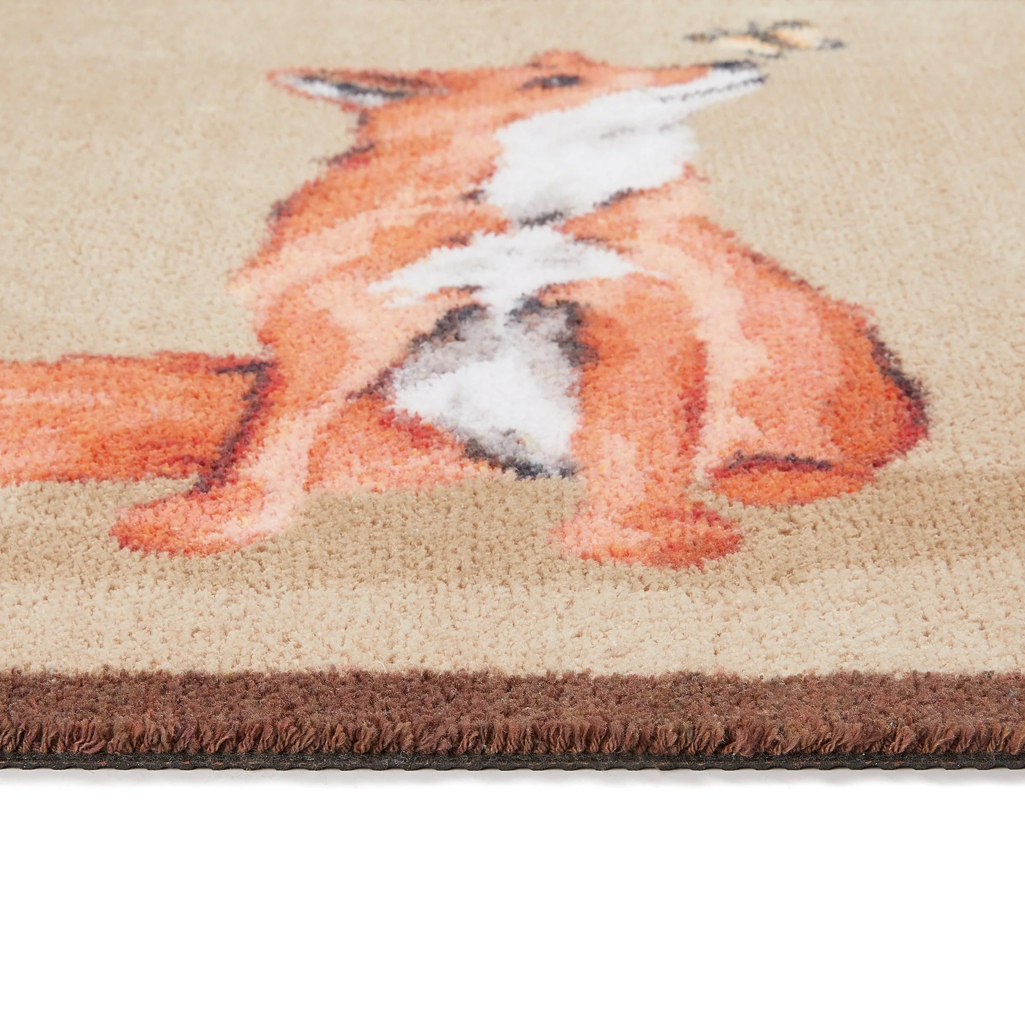 Close-up of Hug Rug Ginger Fox's non-slip backing

