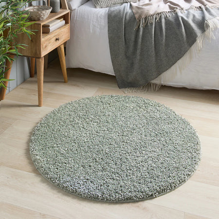 My Rug Green Fleck washable long pile round rug in modern living room