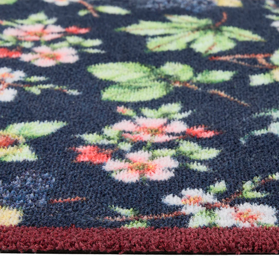 Close-up of Hug Rug berries and hedgerow pattern

