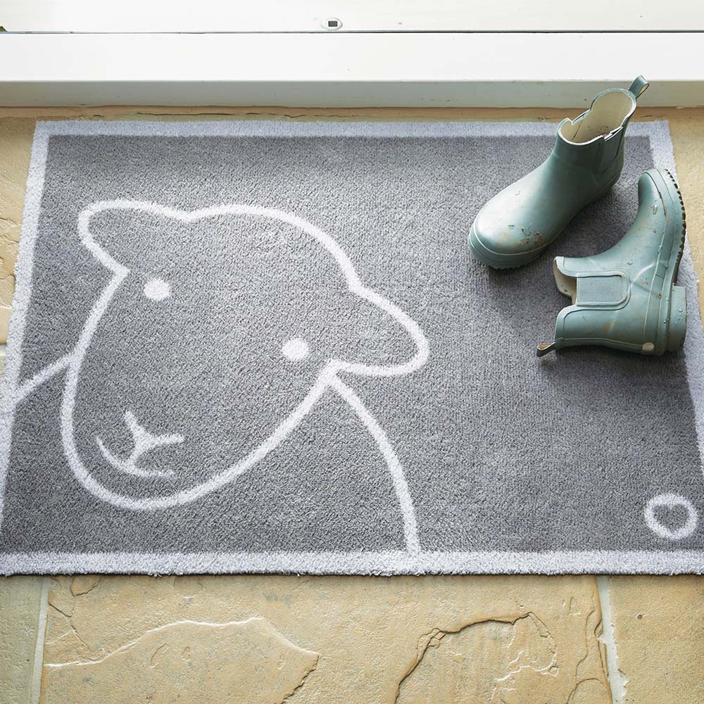 Close-up of Hug Rug Hello Grey Herdy's non-slip backing


