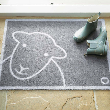 Close-up of Hug Rug Hello Grey Herdy's non-slip backing

