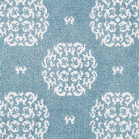 Close-up of Hug Rug heart and house design

