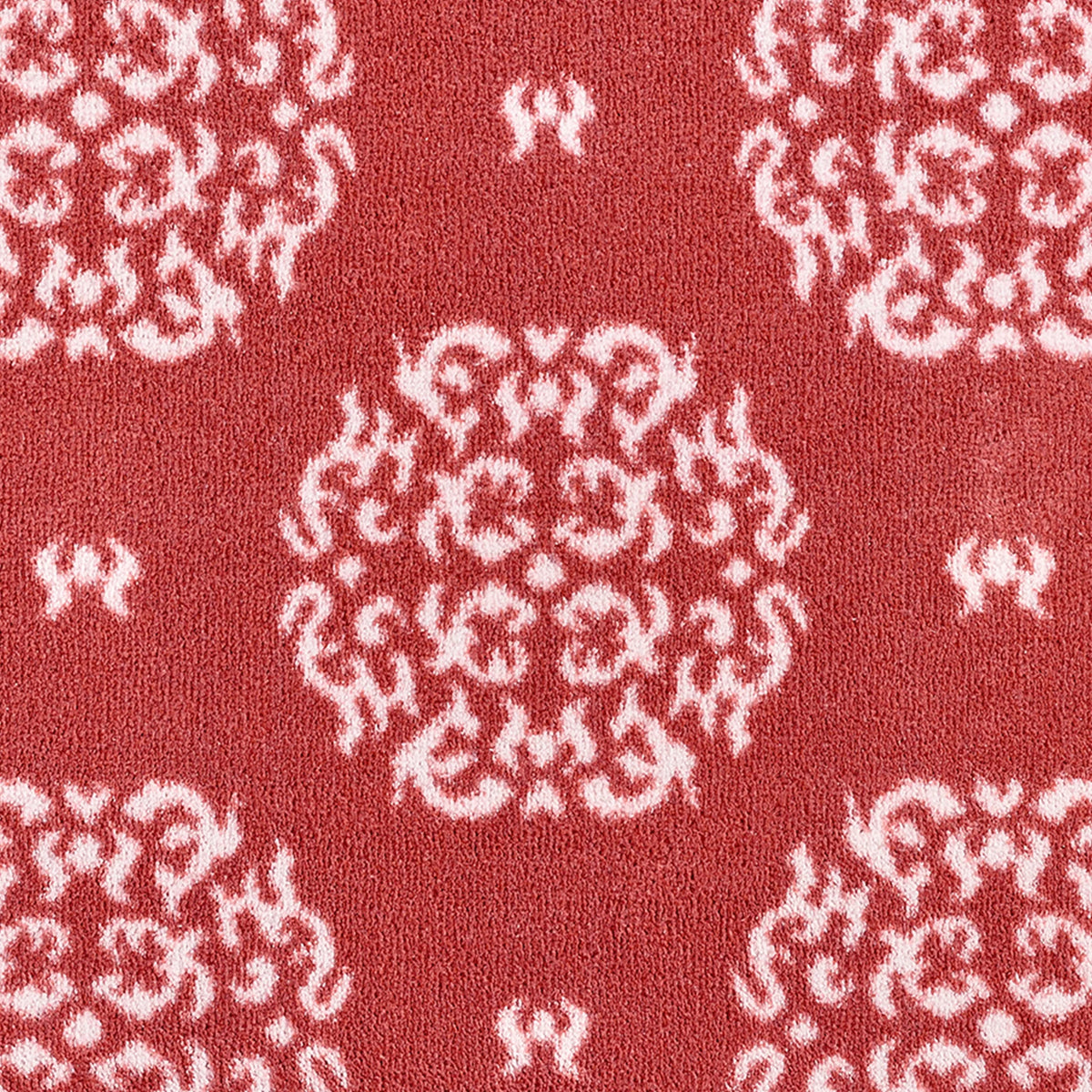 Close-up of Hug Rug heart and house design

