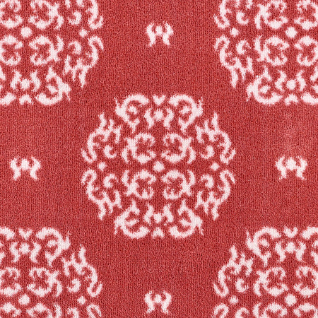 Close-up of Hug Rug heart and house design

