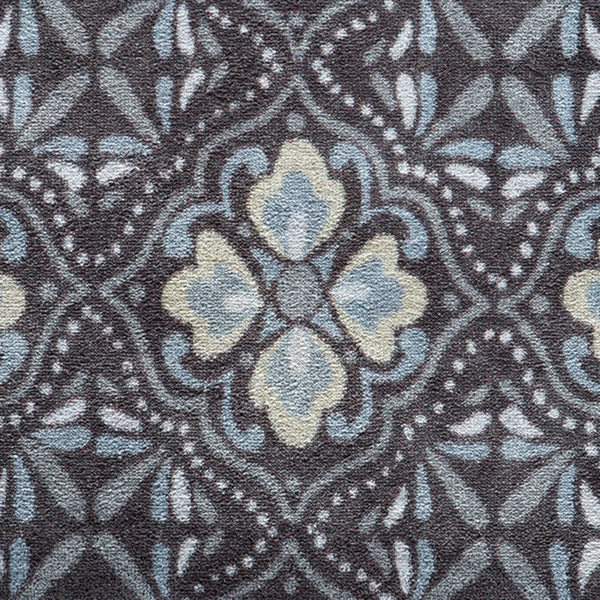 Close-up of Hug Rug heart and house design

