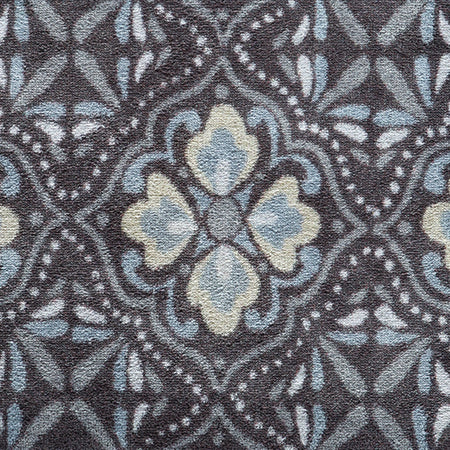 Close-up of Hug Rug heart and house design

