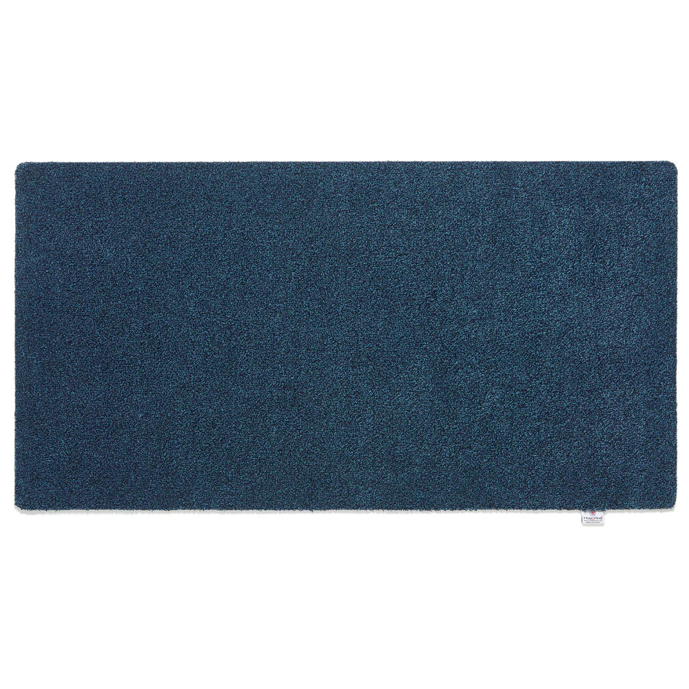 Rectangular blue rug runner on a white background