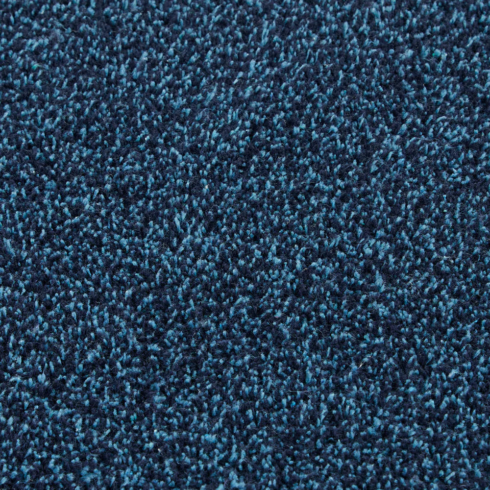 Close-up of Hug Rug indigo fleck texture

