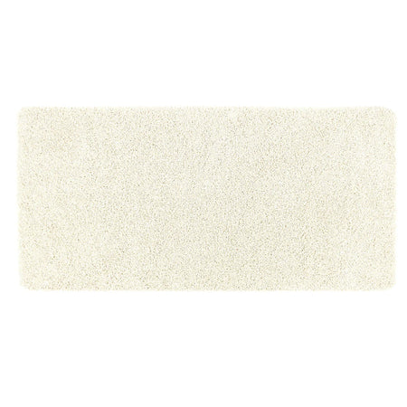 Rectangular beige bath mat on a white background