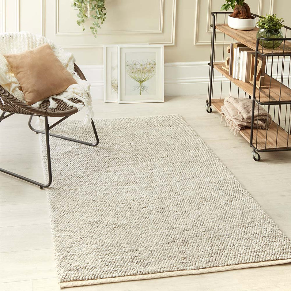 La Playa Silver rug styled in a modern lounge