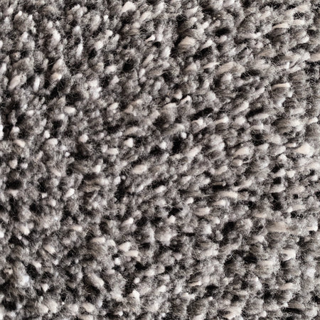 Close-up of Hug Rug light grey fleck texture

