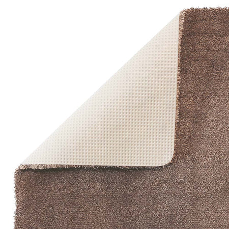 showing backing of bath mat mink