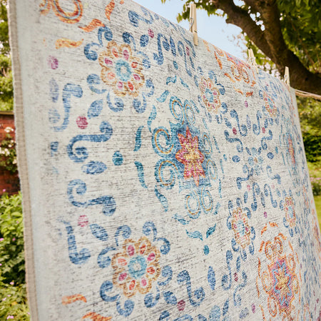 Decorative rug with floral pattern outdoors