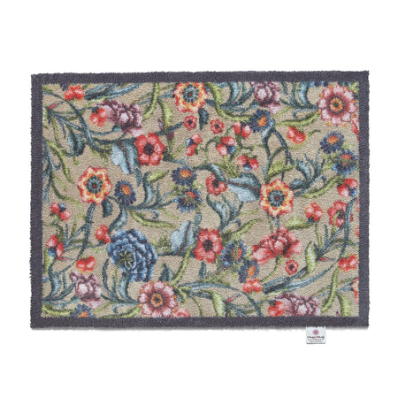 Close-up of Hug Rug bright floral tufting

