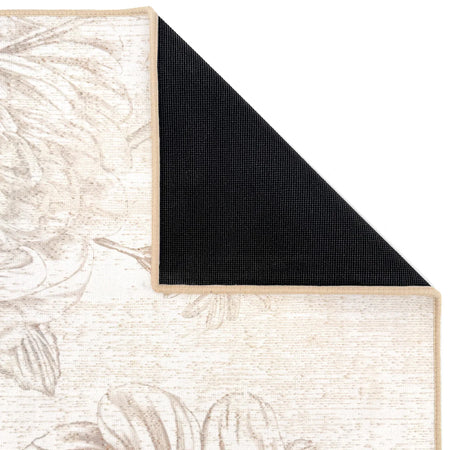 Close-up of a textured rug with a black border on a white background