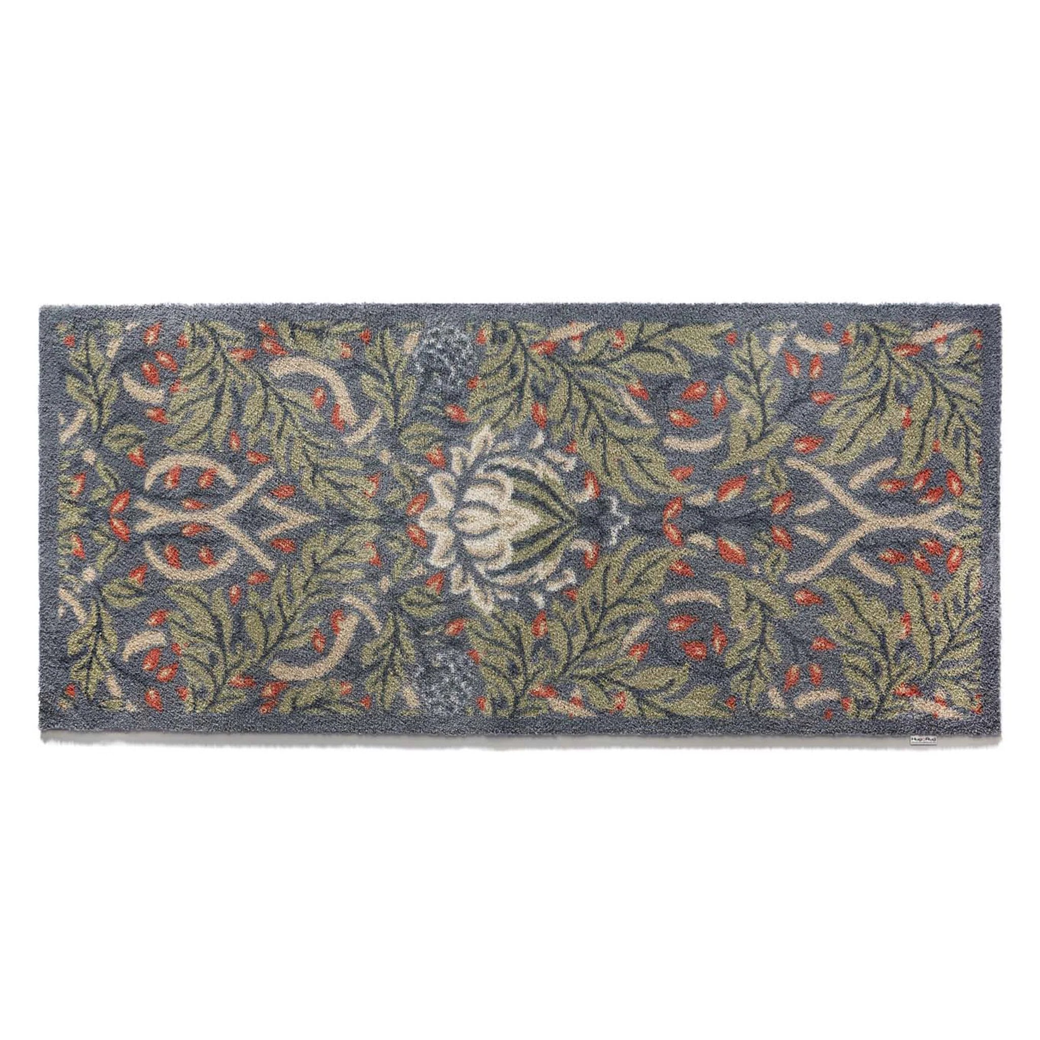 Hug Rug Nature 12 flat-lay showing neutral leaf pattern


