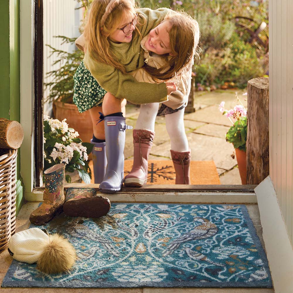 Hug Rug absorbing dirt and moisture near doorway

