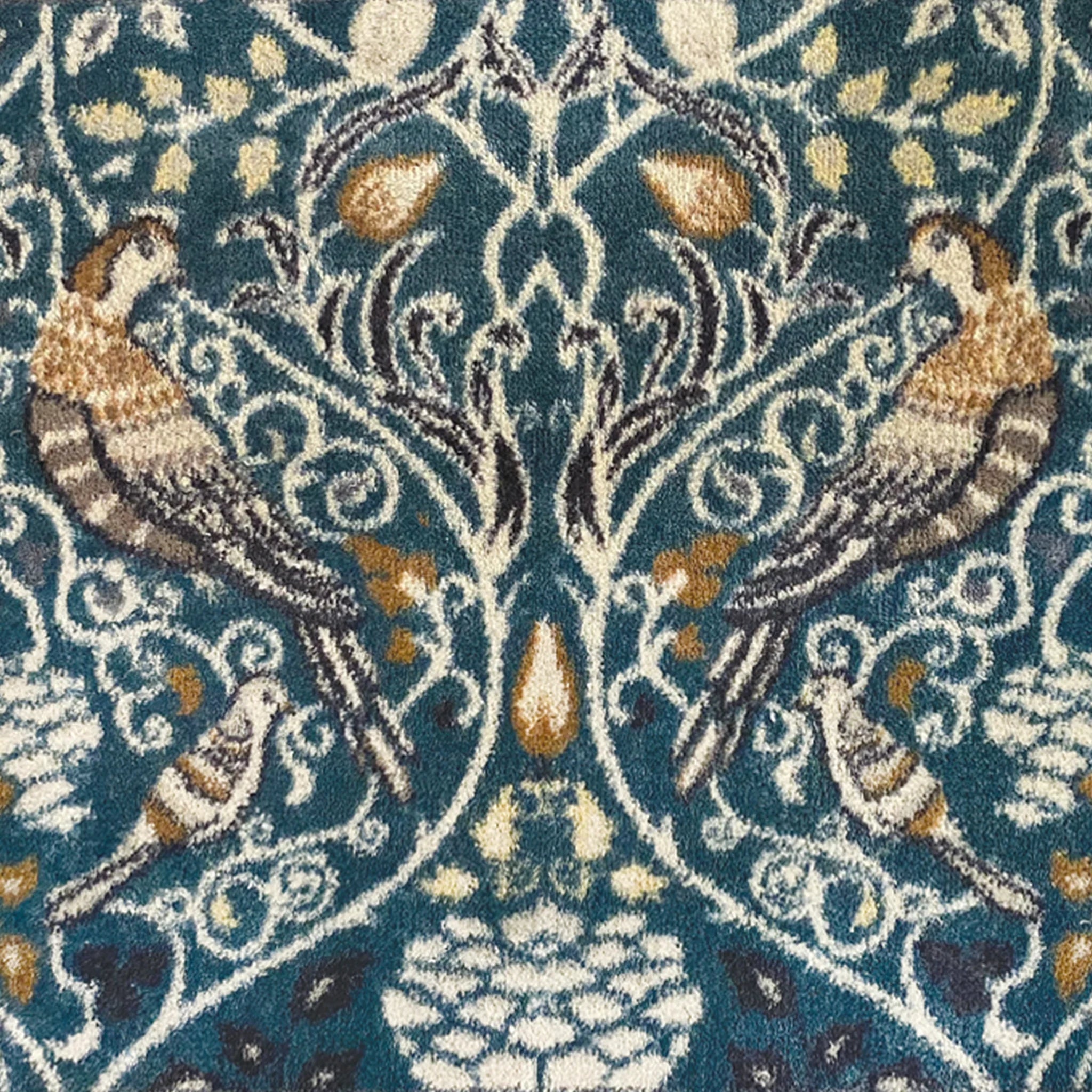 Close-up of Hug Rug floral pattern in earthy tones

