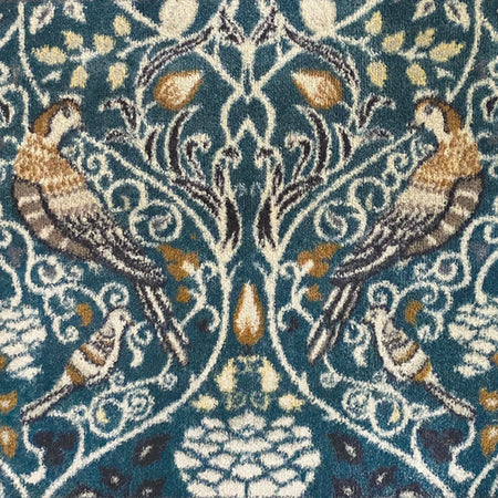 Close-up of Hug Rug floral pattern in earthy tones

