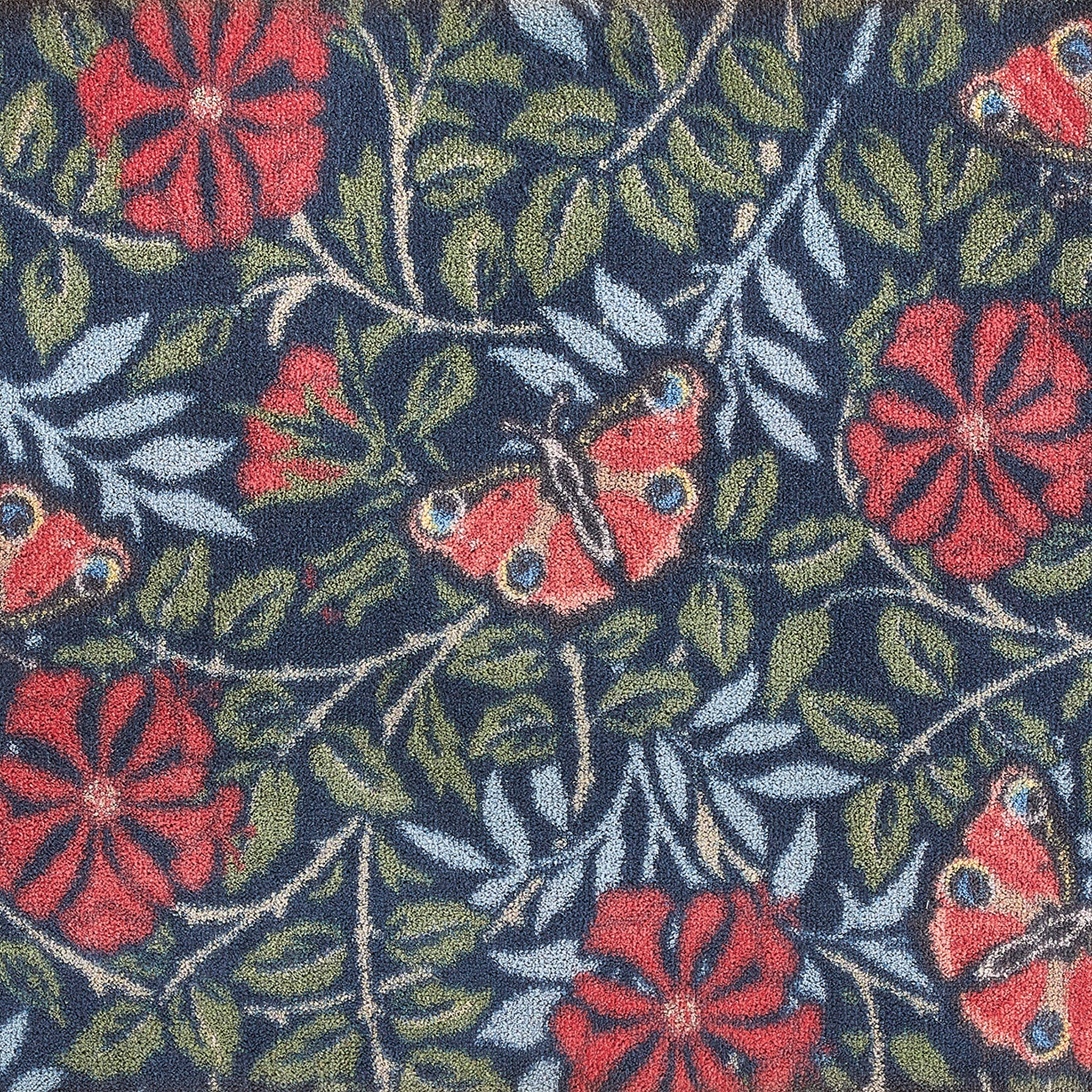 Close-up of Hug Rug delicate leaf pattern

