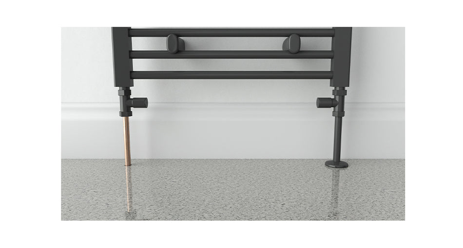 Talon Snappit Anthracite Cover fitted over 15mm radiator pipe with matching collar for a sleek, contemporary finish