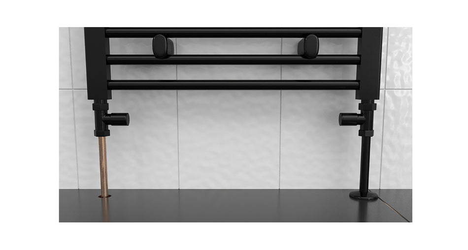Talon Snappit Black Cover fitted over 15mm radiator pipe with matching collar for a sleek black finish