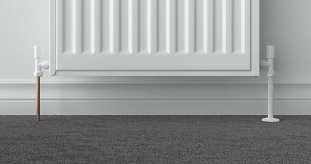Talon Snappit White Pipe Cover fitted over 15mm radiator pipe with matching white collar for a neat finish