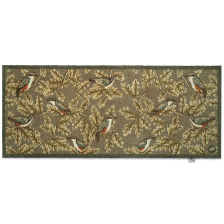Rug with bird and leaf pattern on a white background