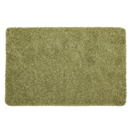 Green doormat on a white background