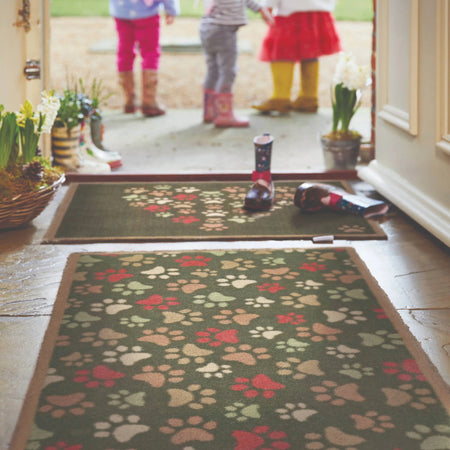Eco-friendly dog mat with heart and paw print design

