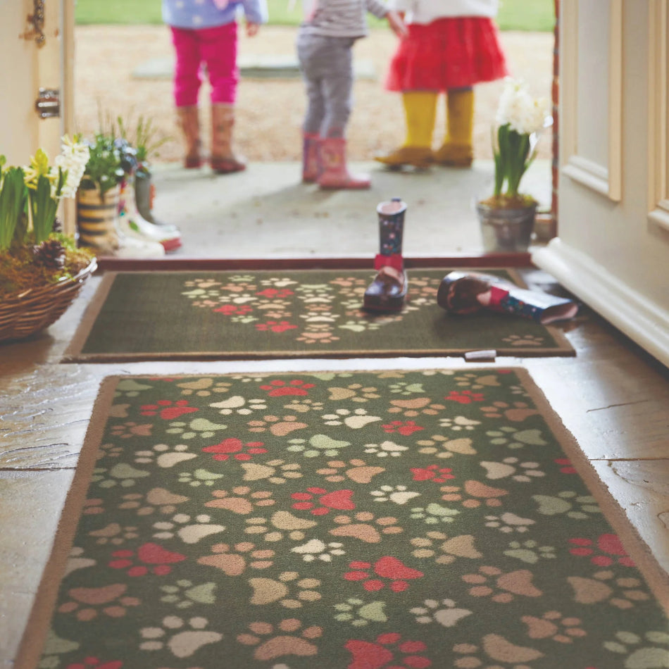 Eco-friendly dog mat with heart and paw print design


