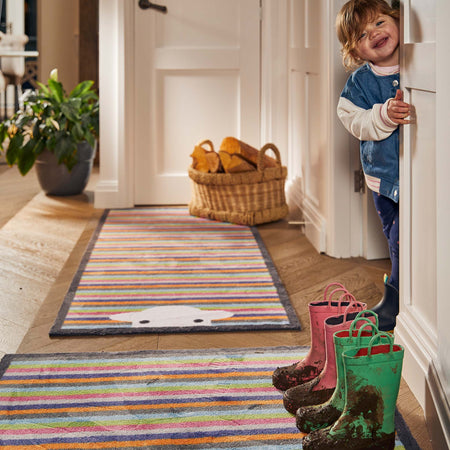 Hug Rug Peep Stripe Herdy Doormat in a modern home setting

