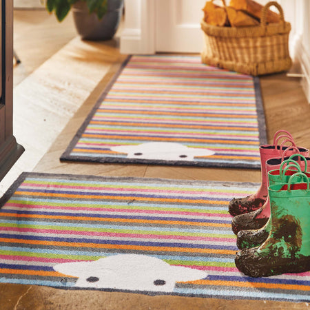 Close-up of Hug Rug Peep Stripe Herdy's non-slip backing

