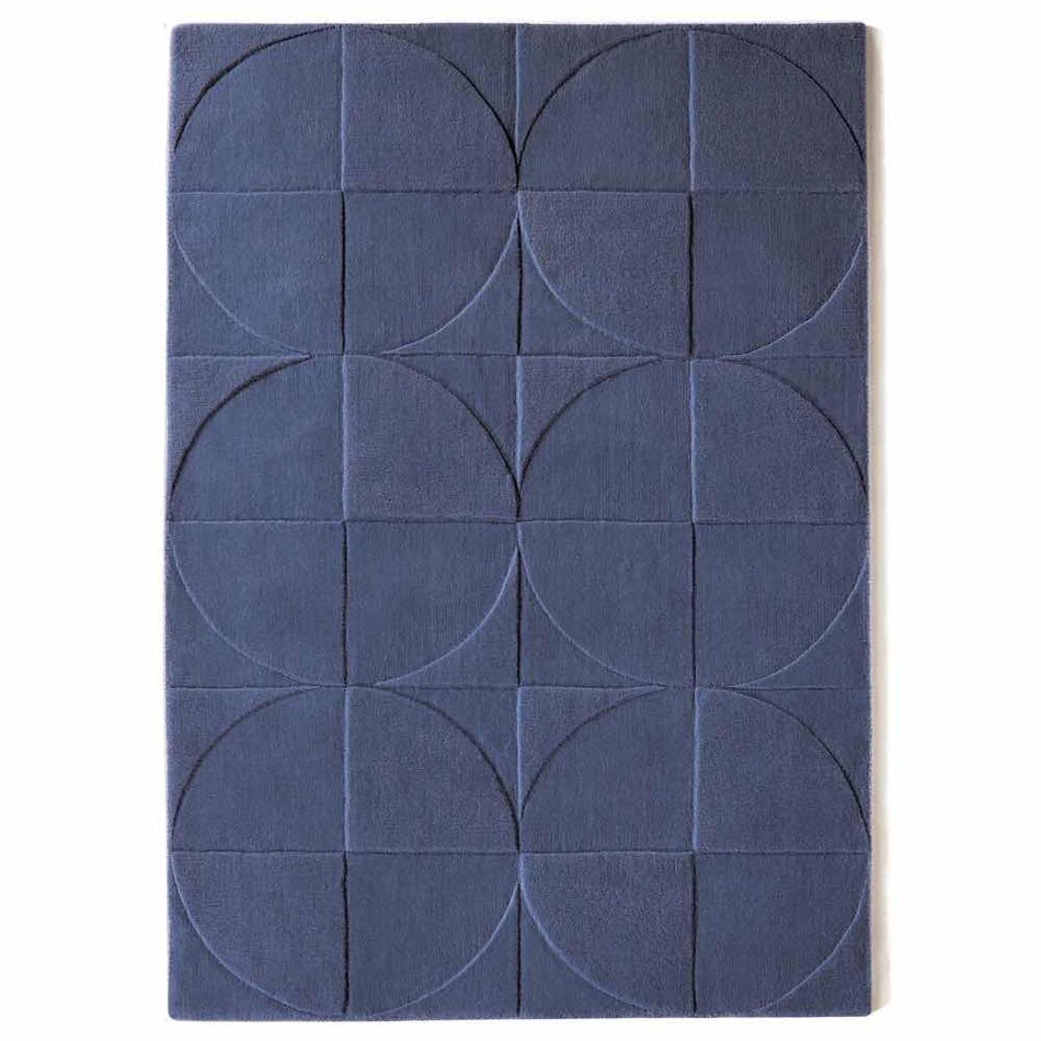 Origins Penny Rug Infinity dark blue wool rug on white background