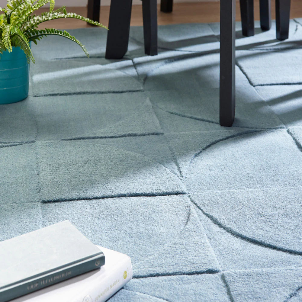 Hand tufted steel blue pure wool rug with carved circular 3D design
