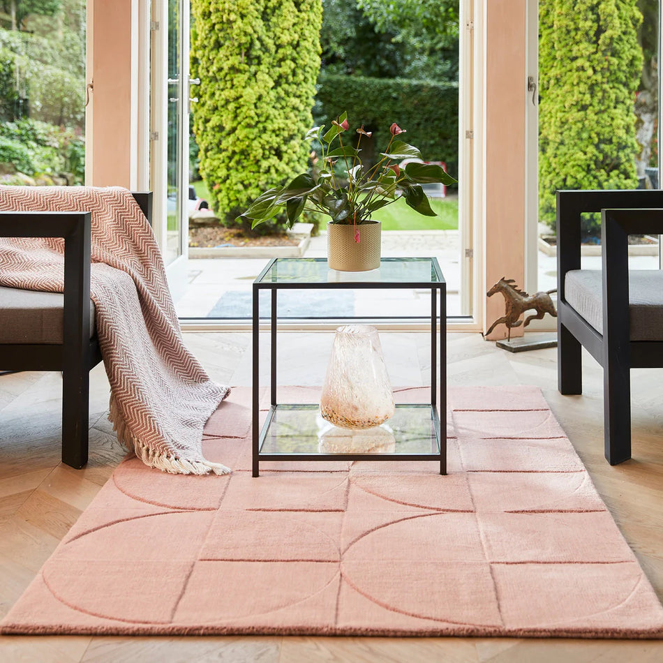 Origins Penny Rug Blush pink wool rug in modern living room