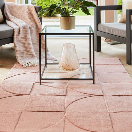 Blush pink geometric rug with soft dense wool pile