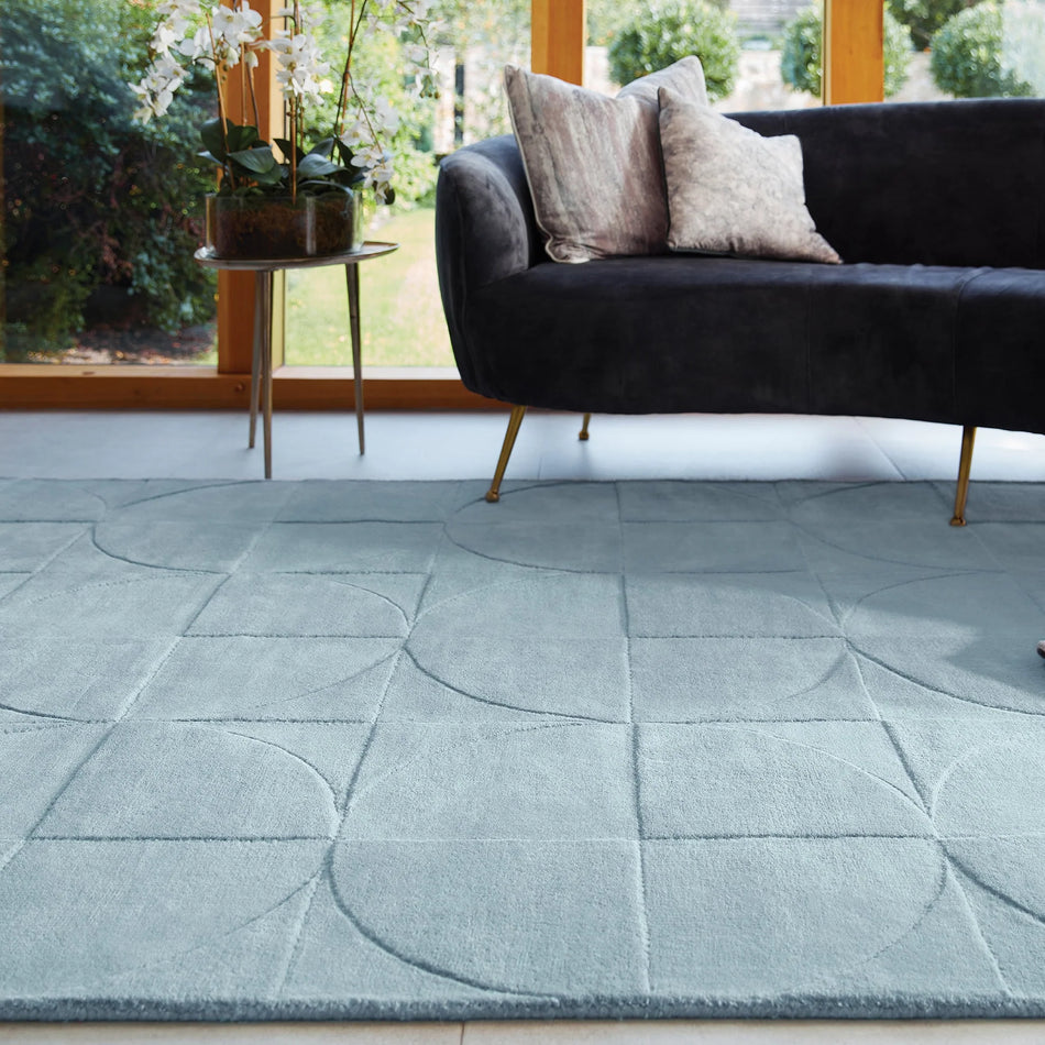 Origins Penny Rug Steel Blue in modern living room décor
