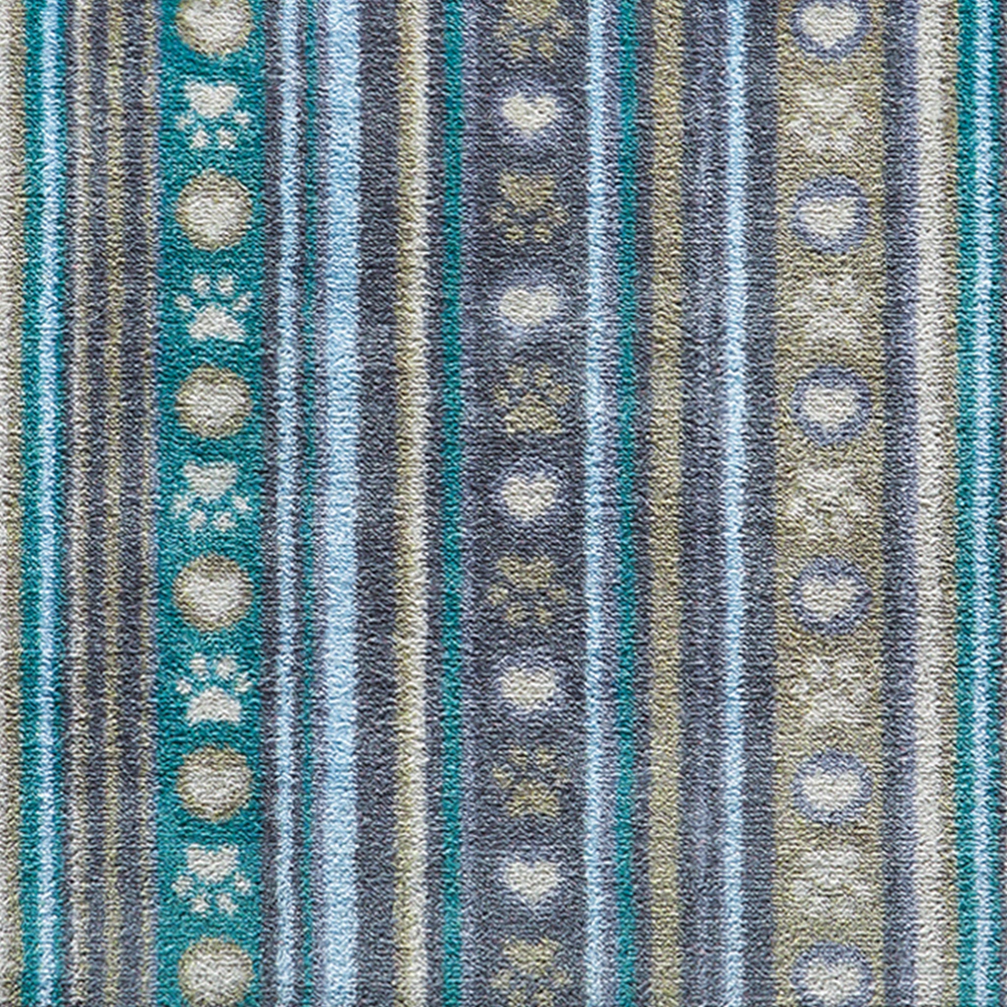 Close-up of Hug Rug Pet 80 textured stripe and paw print detail


