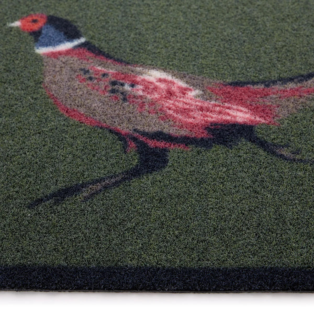 Doormat with a colorful pheasant design on a green background