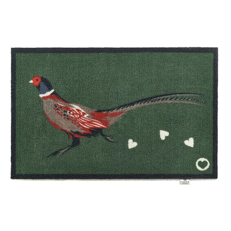 Hug Rug Pheasant Green 2 Barrier Mat placed in a rustic hallway – Perfect for trapping dirt and moisture